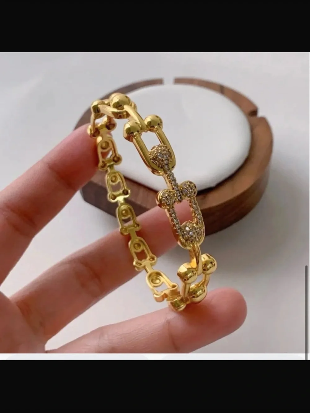 Goldtone bracelet.